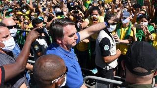 "Arma legal não é para cometer crime, é para evitar crime", diz Bolsonaro